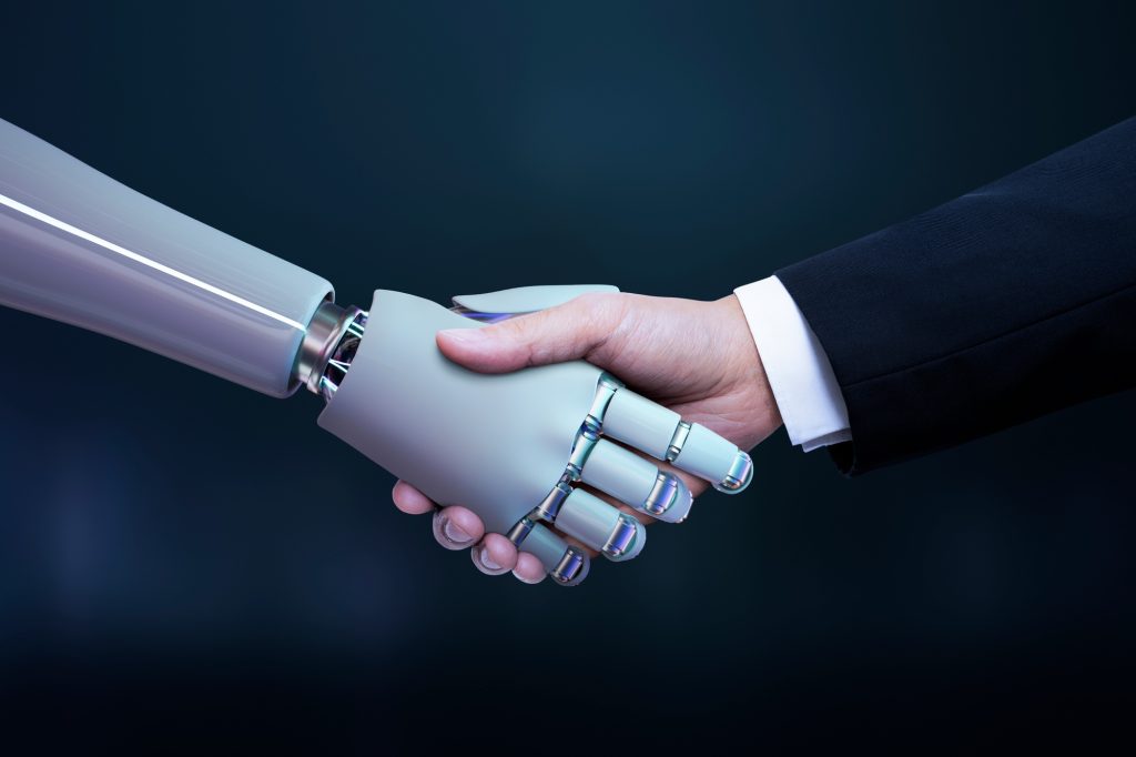 Business hand robot handshake, artificial intelligence digital transformation